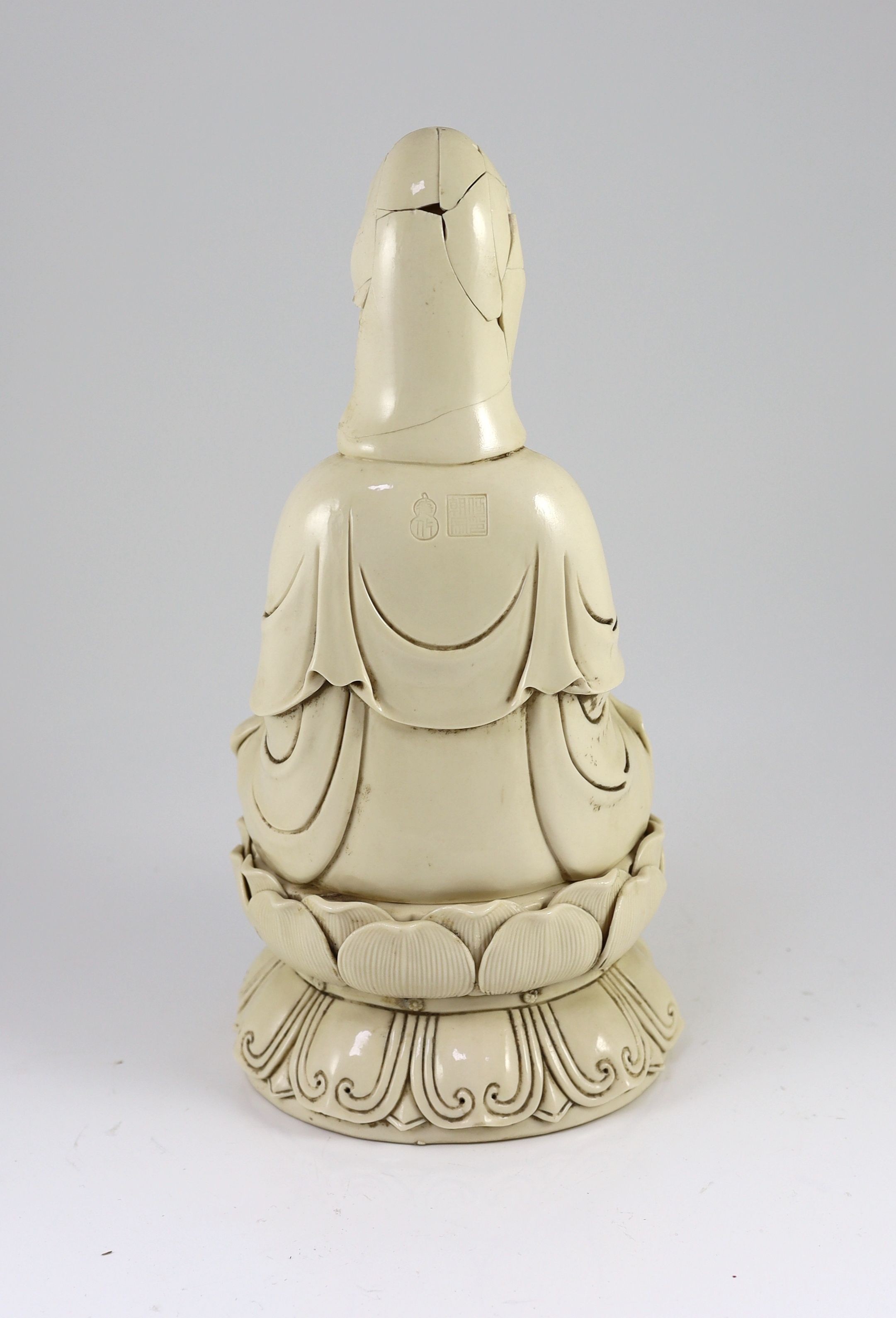 A large Chinese blanc-de-chine figure of Guanyin, Boji Yuren mark, 19th century or later, 36.5 cm high, back of head broken and re-glued